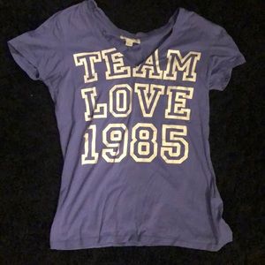 “Team Love” purple shirt